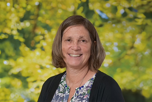 A picture of Neeltje Henneman outside and smiling for the camera.