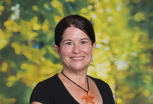 Portrait of Michele S. Diaz smiling for the camera