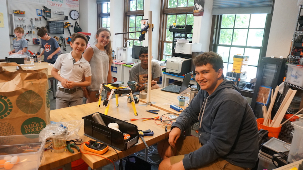 Students of different ages work in a maker's space called the DIB Lab.