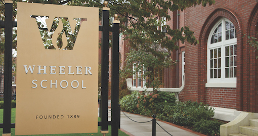 The gold Wheeler sign on the corner of Hope Street.