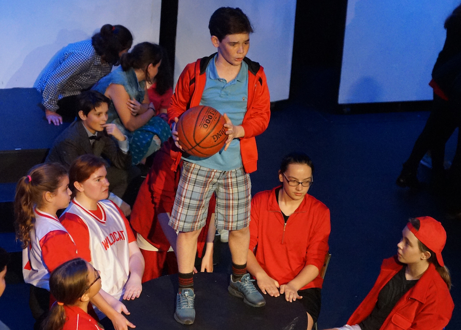 Middle School students perform in a spring musical.