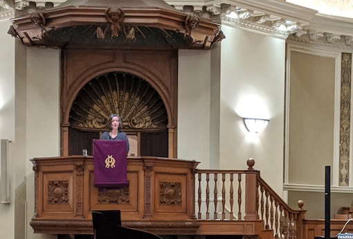 Head of School Allison Gaines Pell delivers her remarks from the podium at the Holiday Festival 2019.