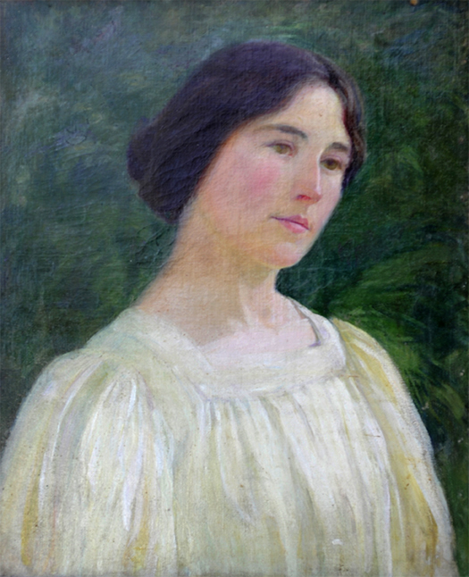 Portrait of a woman with dark hair.