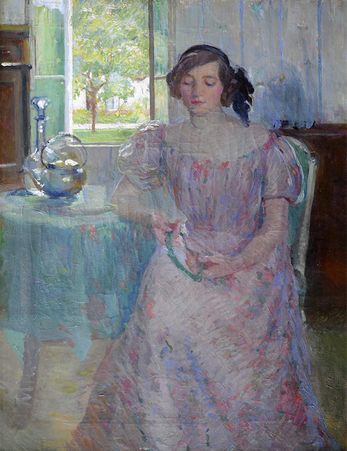 Woman seated at a tea table beside an open window.