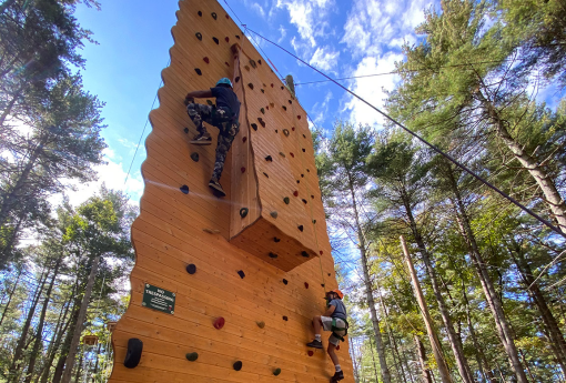 students climb 40 ft climbing wall