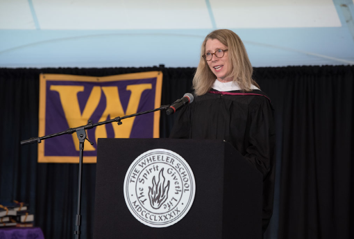 Woman speaking at podium