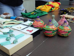 A variety of crafts and jewelry for sale are arranged on a table during the recent fundraiser organized by the Girls Empowerment Club.