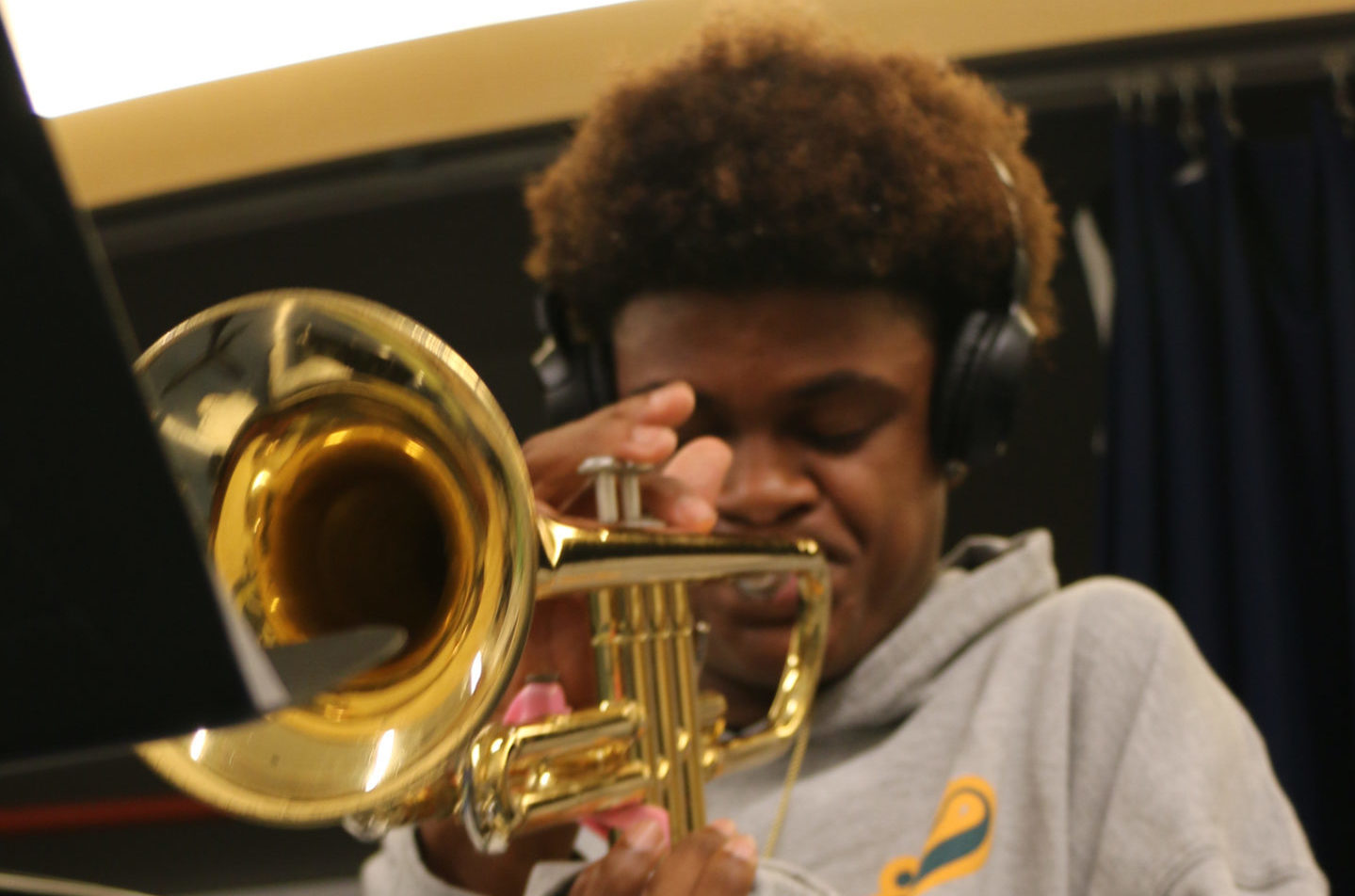 Student playing a trumpet.