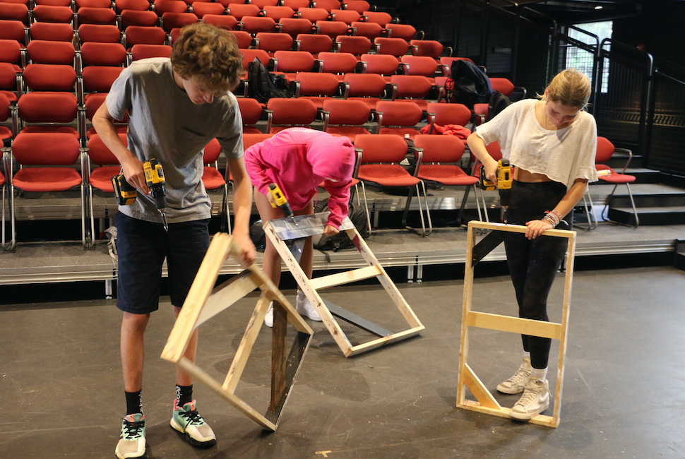 Students building some wooden frames for play tech class.