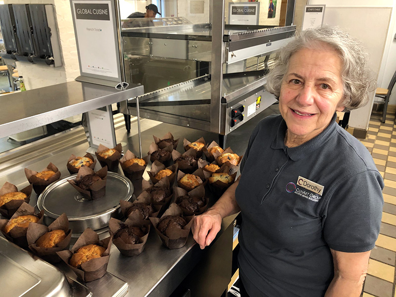 Dorothy Vallee stands in the Wheeler kitchen next to some muffins she made.