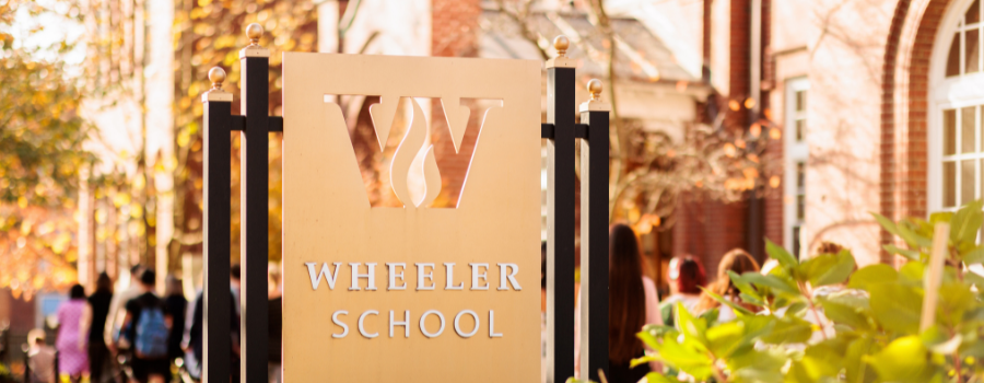 Photo of the Wheeler School's sign in the front of the school.