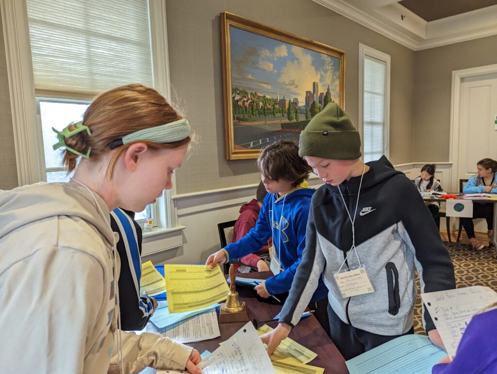 Middle School students collaborate during a Global Studies exercise.