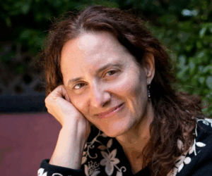 A photo of Ellen Bruno smiling at the camera.
