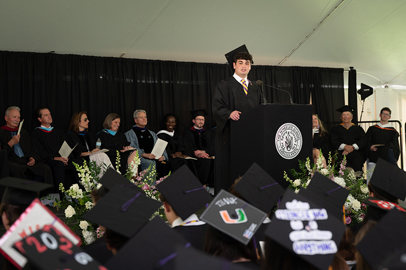 Caleb Isenberg '26 speaks at the podium during Wheeler's 137th Commencement.